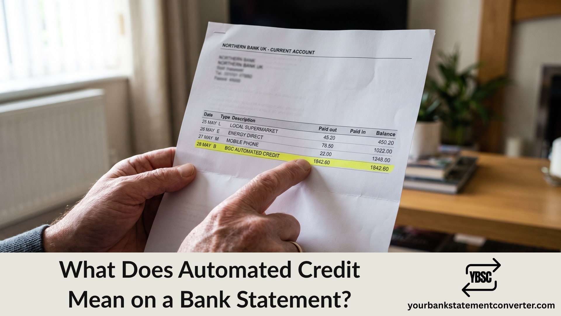 Finger pointing at an automated credit entry on a UK bank statement