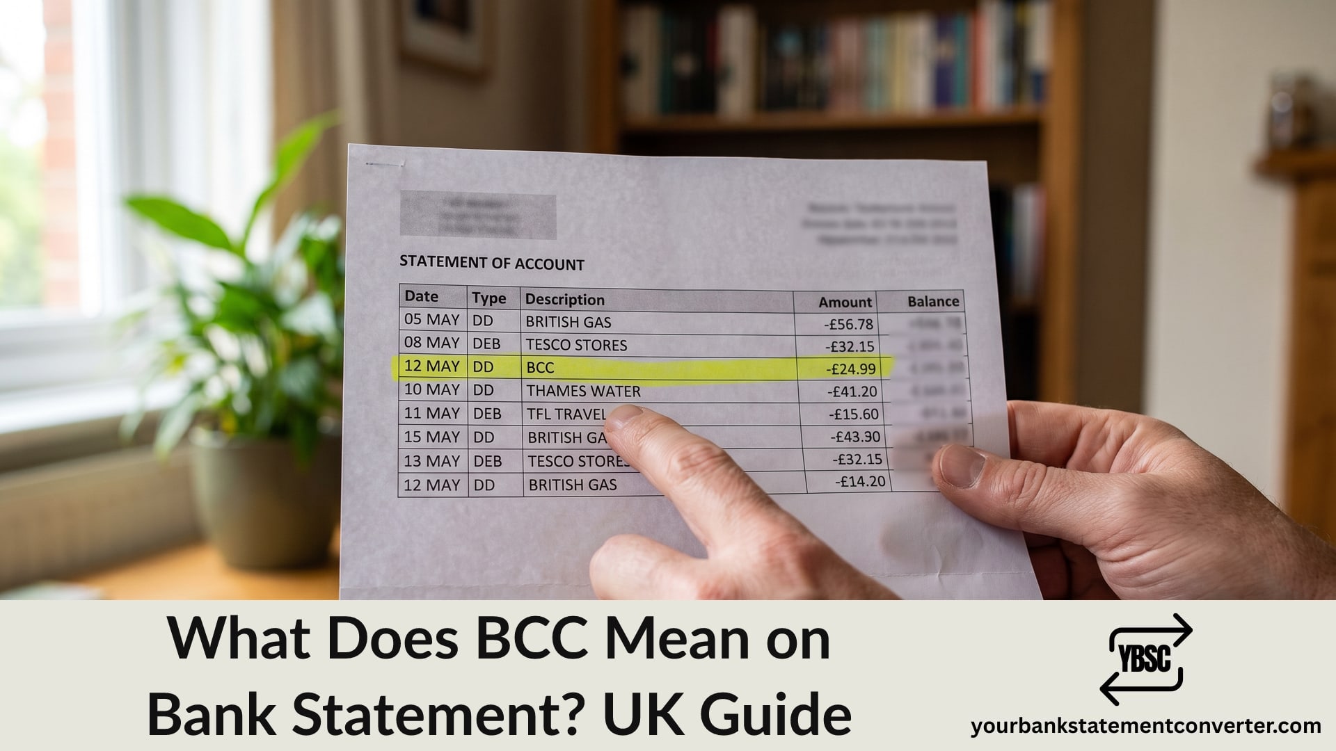Finger pointing at a BCC entry highlighted on a UK bank statement