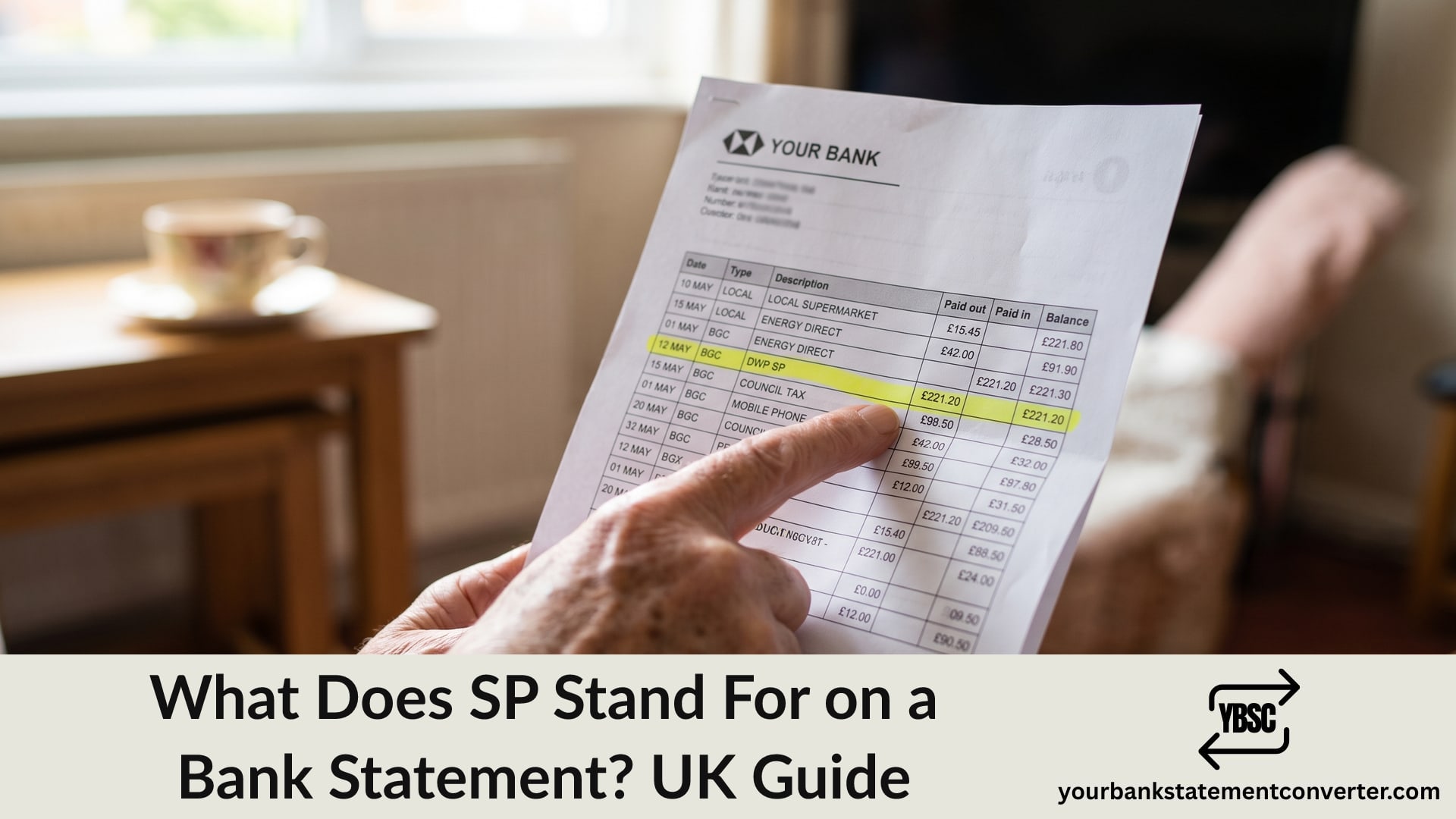 Finger pointing at an SP entry highlighted on a UK bank statement