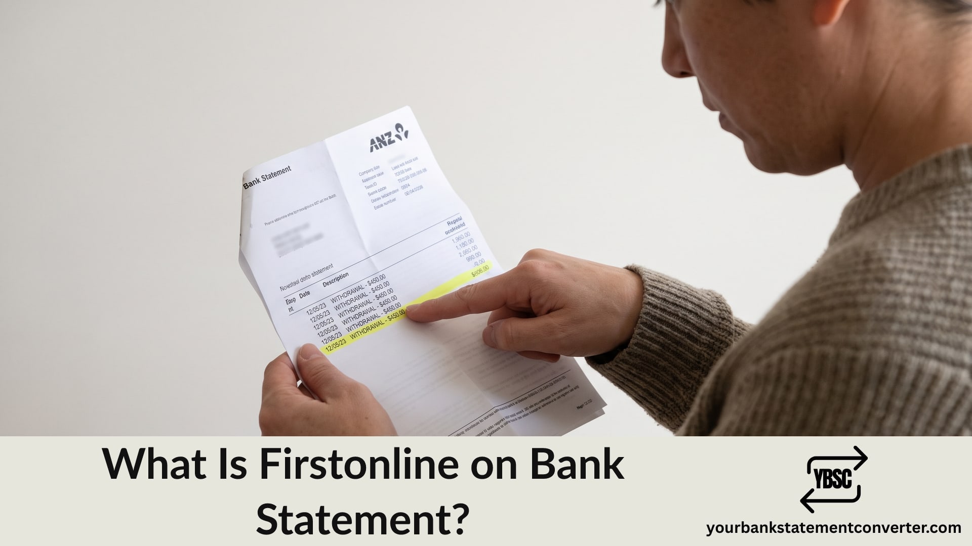 Finger pointing at a Firstonline entry on a bank statement
